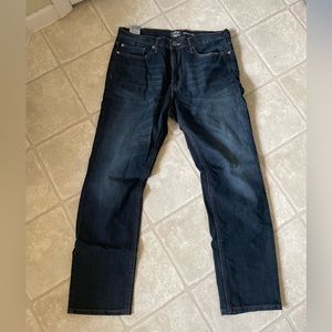 Men’s Levi 34x32 Athletic fit dark rinse jeans. Never worn.